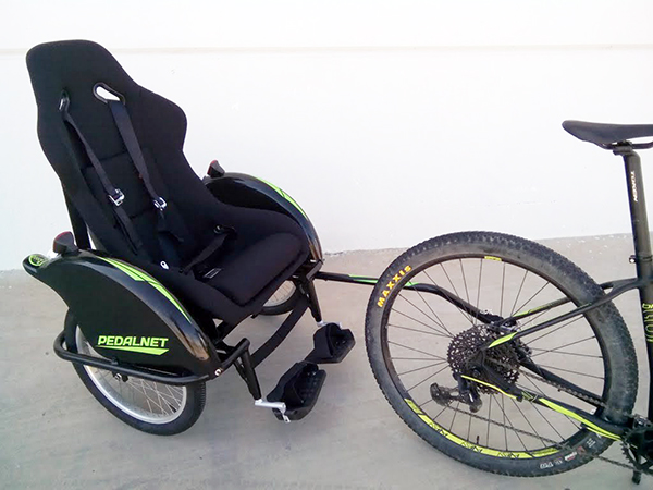 Descubre la libertad y comodidad de nuestras bicicletas con remolques a medida, diseñadas para transporte accesible y seguro.